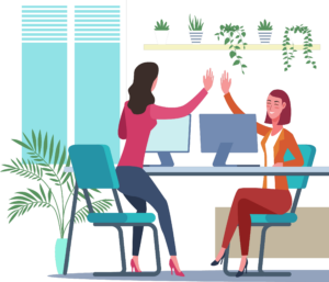 Stock photo of women in business attire high-fiving at a desk with computer monitors